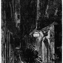 Two men are standing the rain at night, under the lantern of a seedy hotel