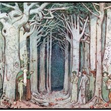 A figure with a long white beard talks to a group of supernatural creatures in a forest