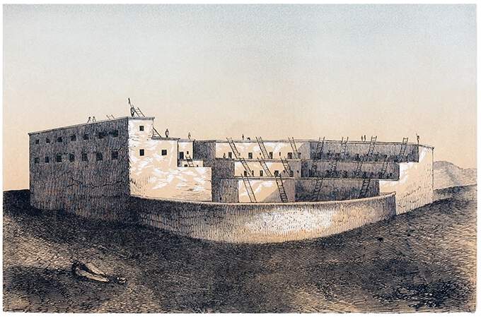 View of a pueblo with terraced structure and a semi-circular wall facing the viewer