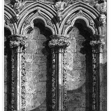 Gothic niches of the old organ screen of Salisbury Cathedral, showing ornate columns