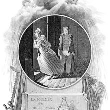 A man stands by a door in a street at night as a woman walks into the brightly lit house