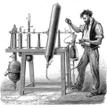 A man operates a machine for making carbonated water and is about to fill a bottle