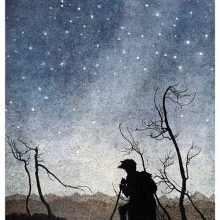 A man is silhouetted against the starry sky as he reaches the top of a hill