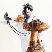 A woman stands holding out a fan as orange dress are decorated with bunches of oranges