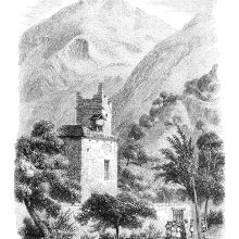 Alpine landscape with mountain peaks, steep slopes, and a building topped with a damaged tower