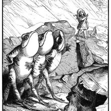 Three frogs stand side by side on their hind legs as a little girl talks and gestures to them
