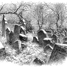 View of a graveyard with leaning headstones randomly arranged and trees in the background