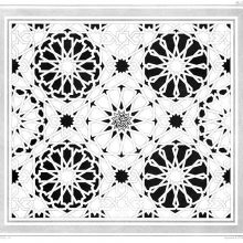 Pavement decoration showing geometric patterns and circular motifs