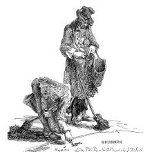 Two men in tatters are carrying brooms, one bending over to write something on the pavement