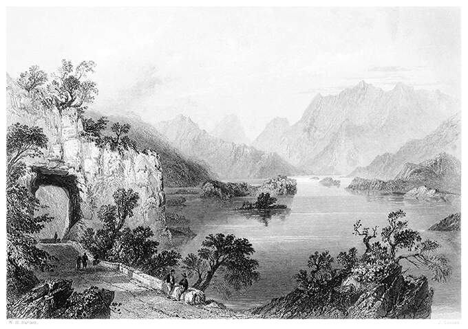 View of the Upper Lake at Killarney, showing a road with a short tunnel cut through the rock