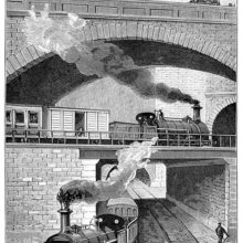 View of a train crossing another over a bridge on the Metropolitan Railway near Clerkenwell Tunnel