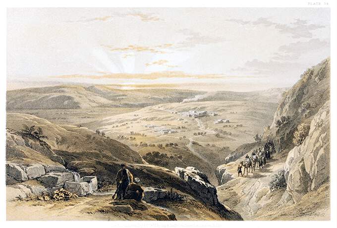 Bird's eye view showing Kafr Kanna and the surrounding countryside lit by the setting sun