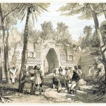 The remains of a Mayan building isolates a place with small groups of men from the forest behind