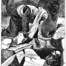 Aladdin emerges from a cave below ground level to meet the African Magician who asks for the lamp