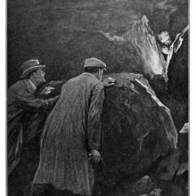 Two men with a gun hide behind a rock as another gazes at them from a similar shelter