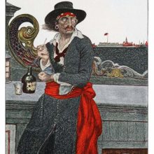 A man wearing a gray coat, a red sash, and a hat stands on the poop deck of a ship smoking a pipe