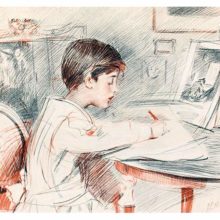 A boy is seen from the side sitting at a table and drawing from a book placed in front of him