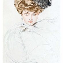 Full-face portrait of a woman with chestnut hair and penetrating blue eyes