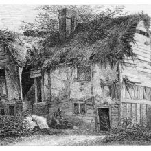 View of a picturesque and weather-worn cottage with a dilapidated thatched roof