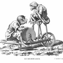 A monkey equipped as a knife grinder sharpens a blade as his female partner pees on his whetstone