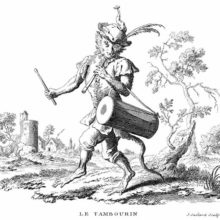 A monkey wearing a feathered hat walks around the countryside playing the pipe and tabor