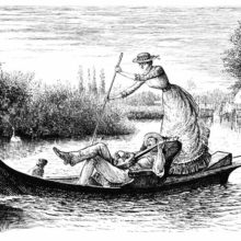 A man reclining on a small river boat plays the banjo as a woman pushs on the oar behind him