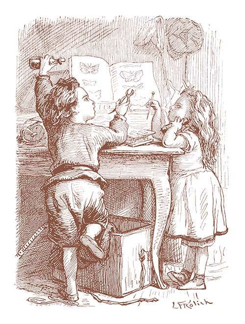 A boy and a girl are leaning on a table, looking at a book with pictures of butterflies