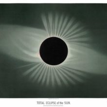 Solar eclipse showing the Moon covering the entire Sun's disk, with light radiating from behind