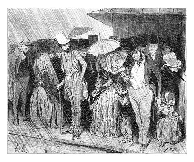 A crowd of travelers is standing on a railway platform, enduring a long wait under the rain