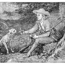 A young man has sat down by a tree to have something to eat, of which he gives a morsel to his dog