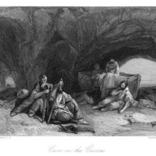 Six tired men have found refuge in a cave by the sea, where they are recuperating