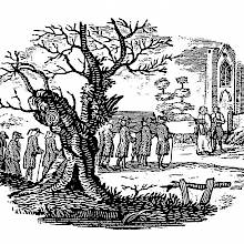 A tree in the foreground partly hides a funeral procession arriving at the church