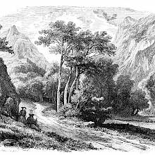 View of the Aosta valley with two travelers on the side of a road and mountains in the background